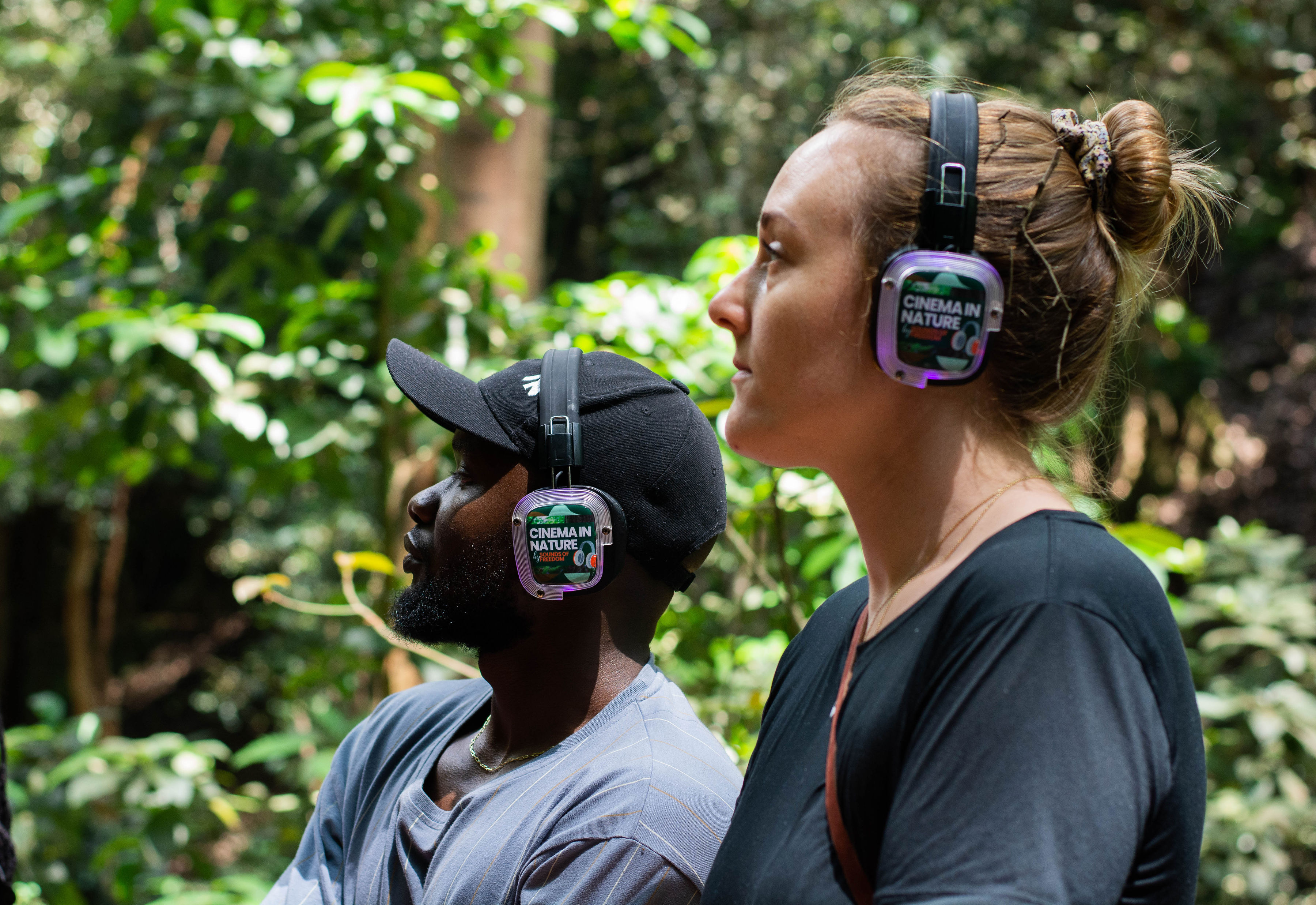 People experiencing immersive audio in nature